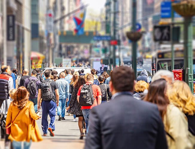 New York, streets. High buildings and crowd walking